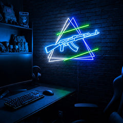 AK Double Triangle LED neon sign in the Arctic Voltage colorway, mounted on a brick wall in a gaming room