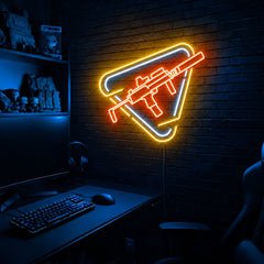 Rifle Rounded Triangle LED neon sign in the Solar Flare colorway, mounted on a brick wall in a gaming room