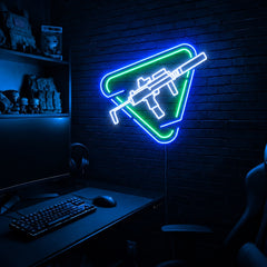 Rifle Rounded Triangle LED neon sign in the Arctic Voltage colorway, mounted on a brick wall in a gaming room