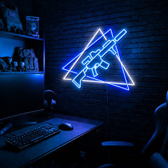 Rifle Offset Triangles LED neon sign in the Arctic Voltage colorway, mounted on a brick wall in a gaming room