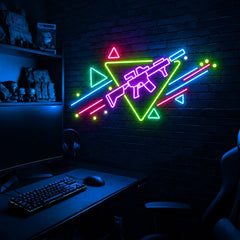 Rifle Memphis Triangle LED neon sign in the Toxic Circuit colorway, mounted on a brick wall in a gaming room