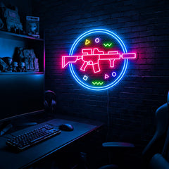 Rifle Circle Confetti LED neon sign in the Original colorway, mounted on a brick wall in a gaming room
