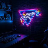 Rifle Inverted Triangle Confetti LED neon sign in the Original colorway, mounted on a brick wall in a gaming room
