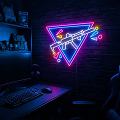 Rifle Inverted Triangle Confetti LED neon sign in the Original colorway, mounted on a brick wall in a gaming room