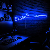 Suppressed Lever Gun LED neon sign in Blue on a clear backerboard in the TacArtCo gaming room