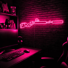 Suppressed Lever Gun LED neon sign in Pink on a clear backerboard in the TacArtCo gaming room